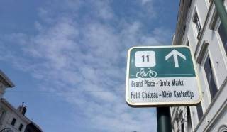 Fresque murale colorée lors du festival ANTE à Bruxelles, street art vibrant et événement culturel.